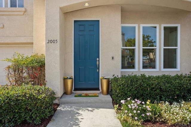 entrance to property with a garage