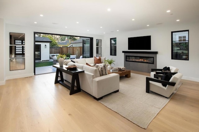 living room with light hardwood / wood-style floors