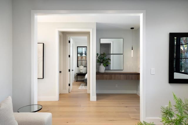 hall featuring light hardwood / wood-style floors