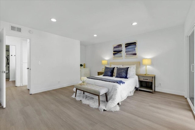 bedroom with light hardwood / wood-style floors