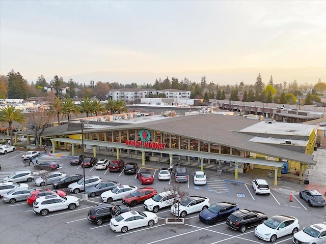 view of parking at dusk