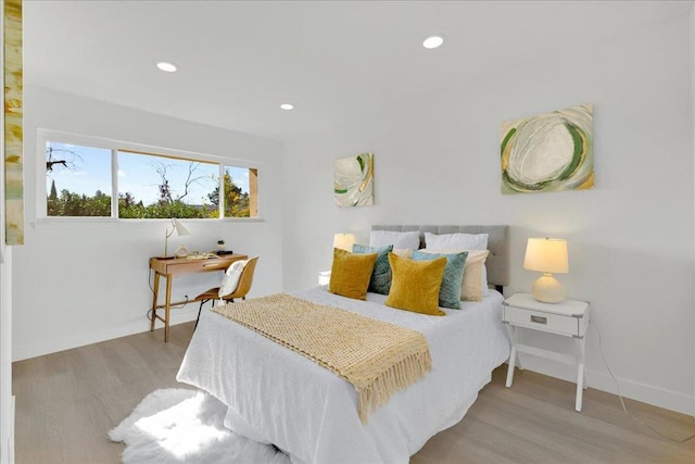 bedroom featuring light wood-type flooring