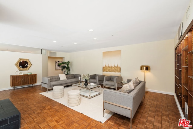 living room with dark parquet flooring