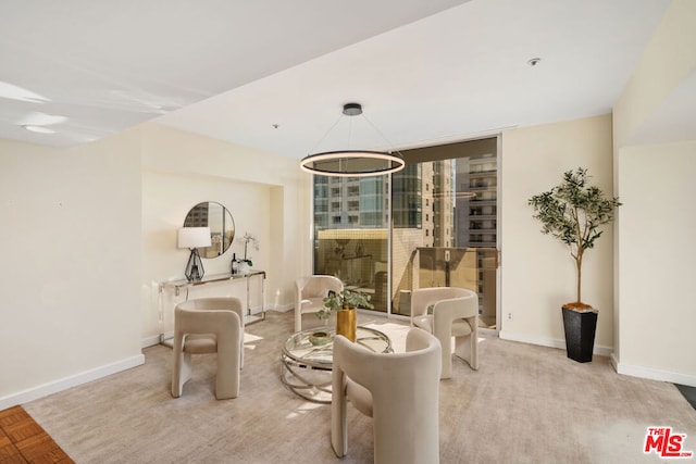 living area featuring light parquet flooring and a fireplace