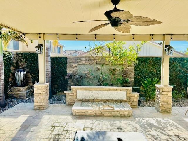 view of patio / terrace with ceiling fan