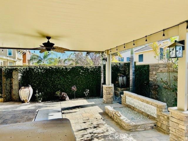 view of patio / terrace with ceiling fan