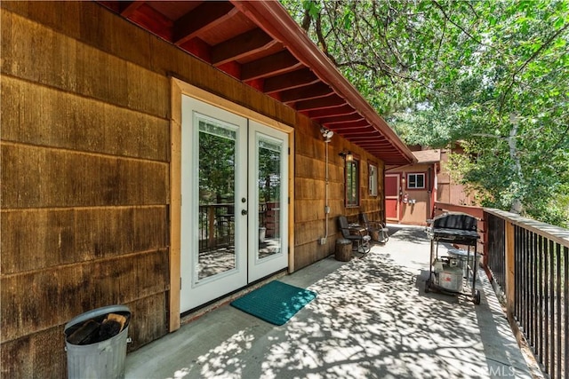 view of patio / terrace with a grill and french doors