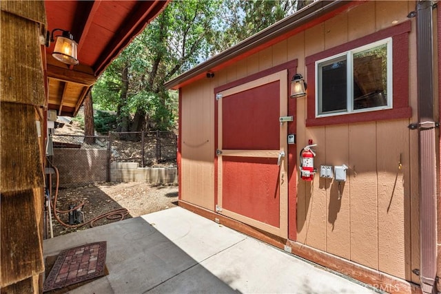 property entrance with a patio area