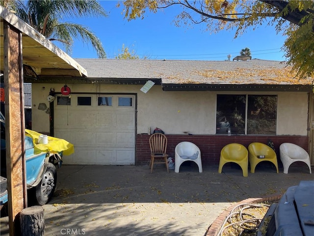 exterior space with a garage