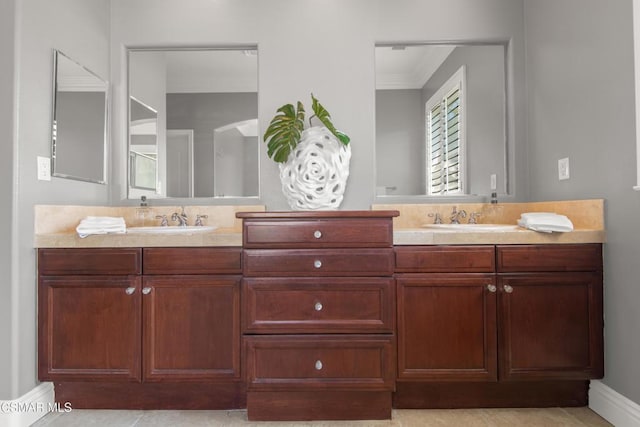 bathroom featuring vanity and crown molding