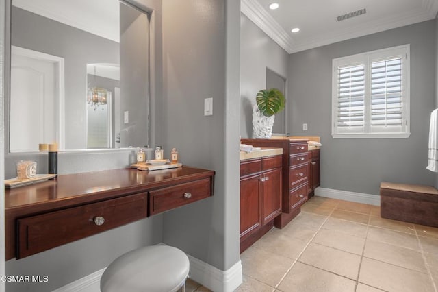 bathroom featuring ornamental molding, tile patterned floors, and vanity