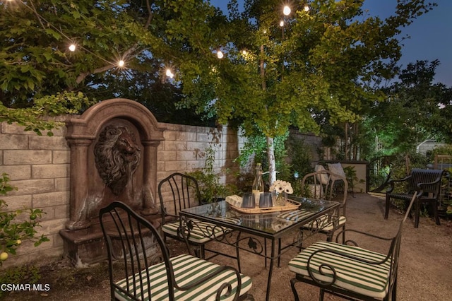 view of patio at night