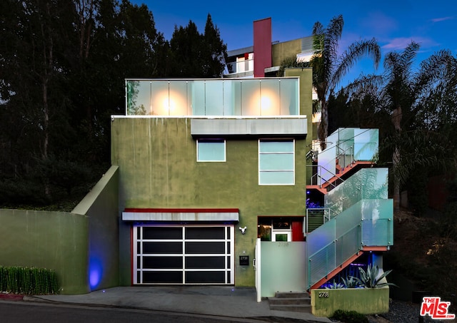 modern home featuring a garage