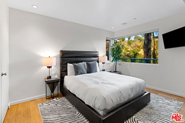 bedroom featuring light wood-type flooring