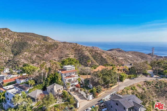 drone / aerial view featuring a mountain view