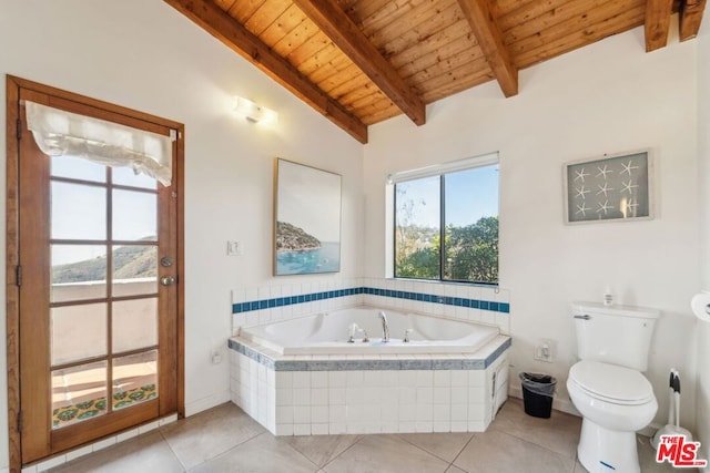 bathroom featuring lofted ceiling with beams, tiled bath, wood ceiling, toilet, and tile patterned floors