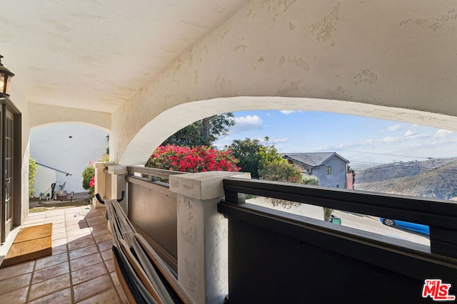 view of patio with a balcony