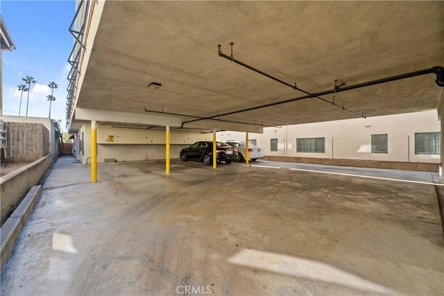 garage featuring a carport