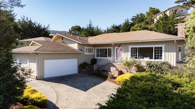 view of front of property with a garage