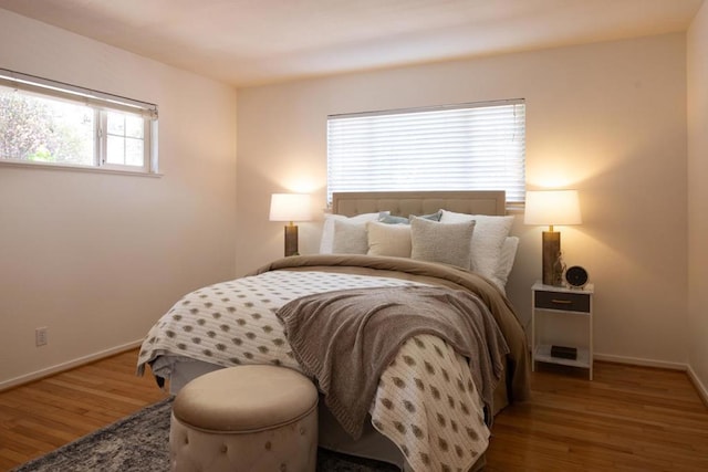 bedroom featuring hardwood / wood-style floors