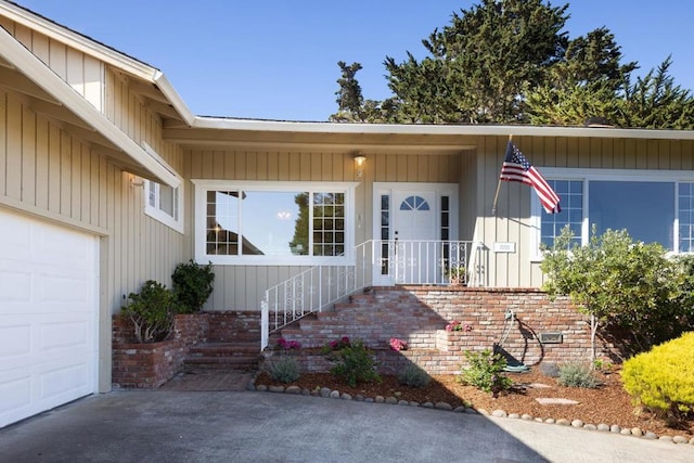 property entrance featuring a garage