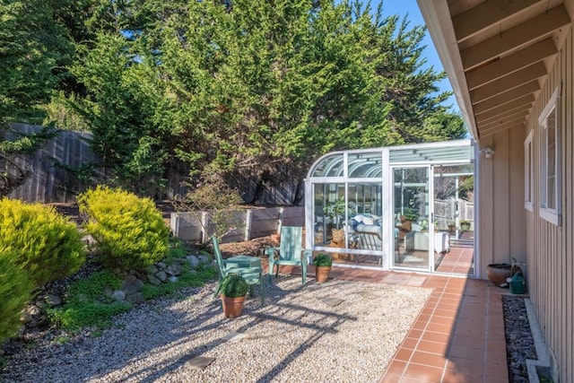 view of yard with a sunroom