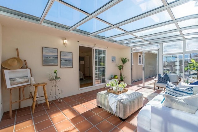 sunroom / solarium featuring a skylight