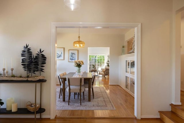 dining area featuring wood-type flooring