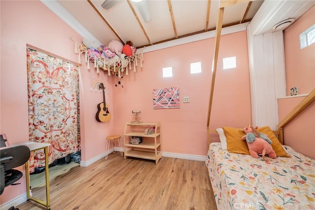 bedroom featuring ceiling fan and light wood-type flooring