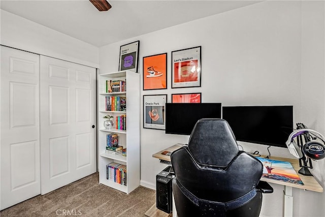 office with ceiling fan and carpet