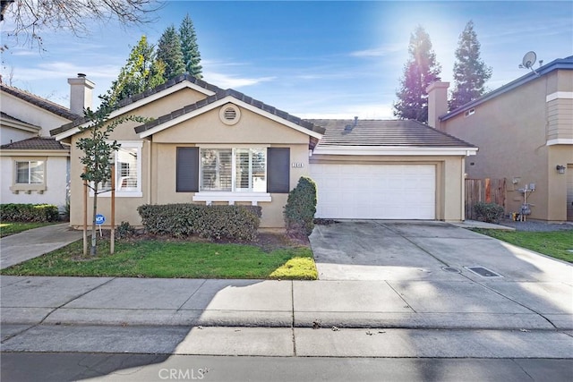 single story home featuring a garage