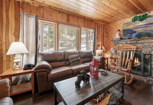 living room with dark hardwood / wood-style floors, a wealth of natural light, and wooden ceiling