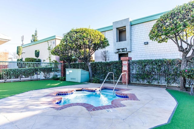 view of pool featuring a patio