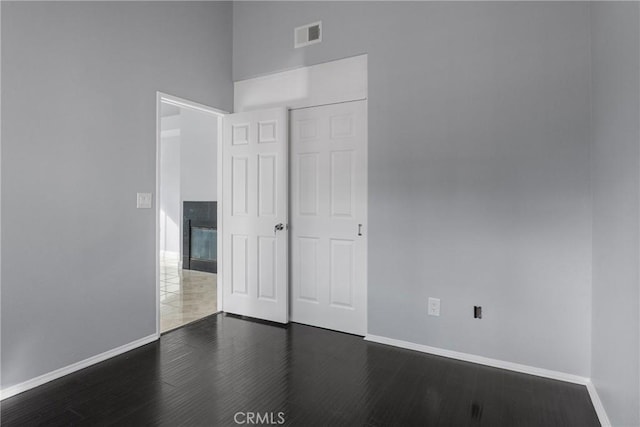 interior space with a towering ceiling