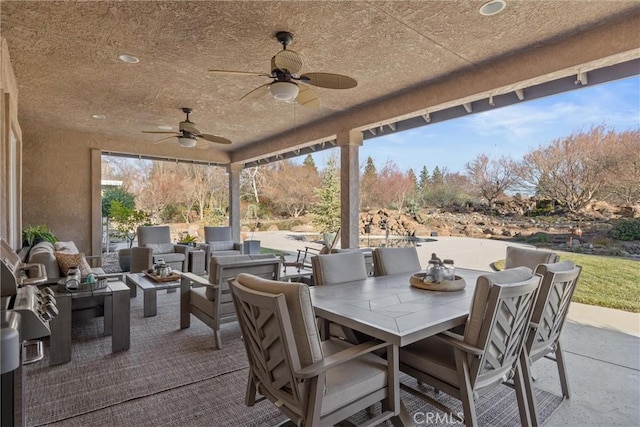 view of patio featuring ceiling fan and outdoor lounge area