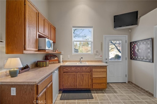 kitchen featuring dishwasher and sink