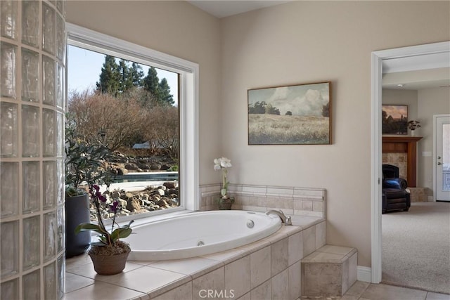 bathroom with tiled bath