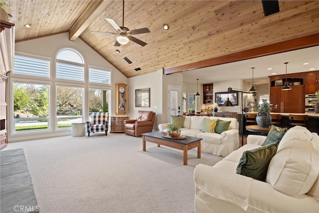 living room featuring ceiling fan, beam ceiling, high vaulted ceiling, wooden ceiling, and light colored carpet