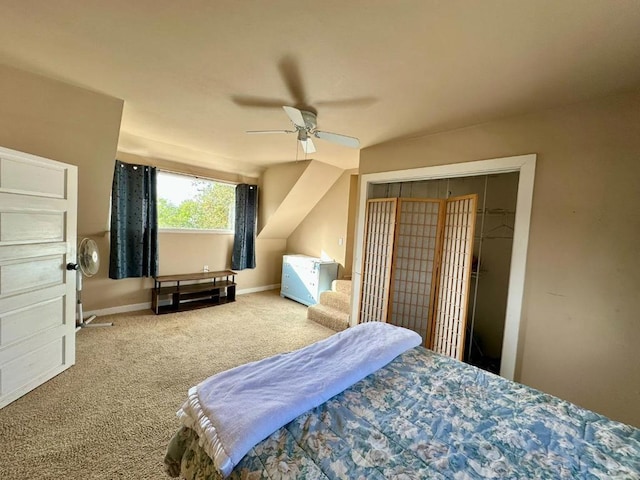 bedroom featuring a closet, ceiling fan, and carpet flooring