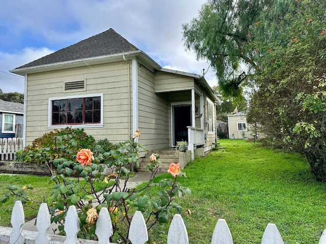 view of property exterior featuring a yard