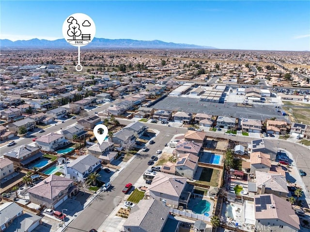 drone / aerial view featuring a mountain view