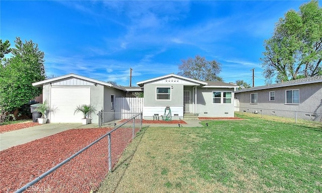 view of front facade with a garage and a front lawn