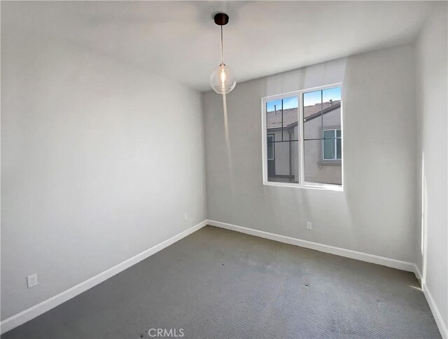 empty room with carpet flooring