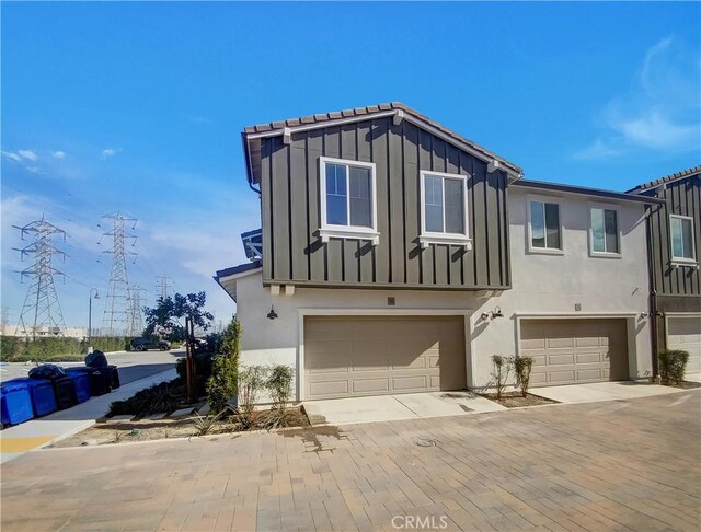 view of front of property with a garage