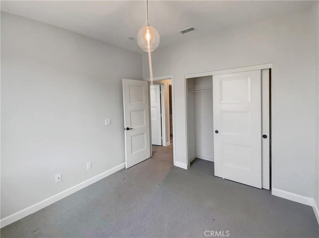 unfurnished bedroom featuring a closet