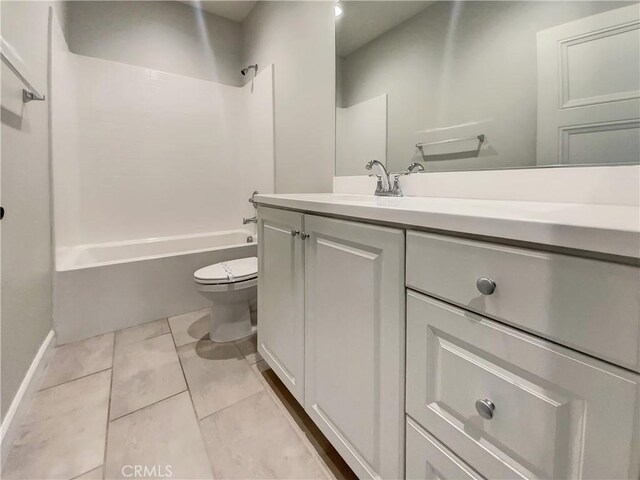 full bathroom with vanity, tile patterned flooring,  shower combination, and toilet