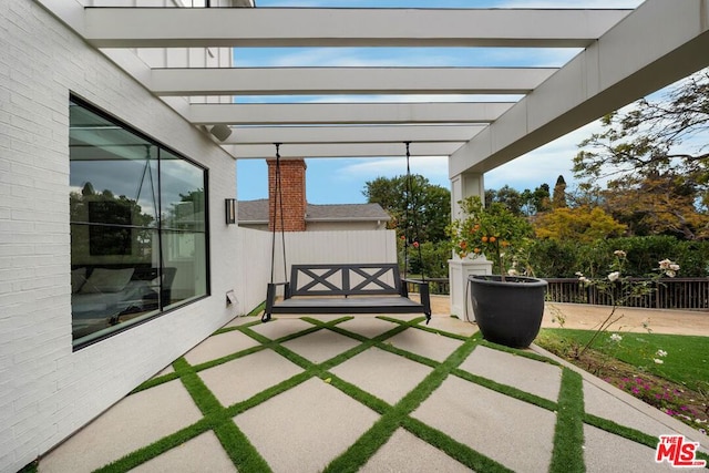 view of patio / terrace featuring a pergola