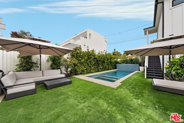 view of pool featuring a yard and an outdoor hangout area