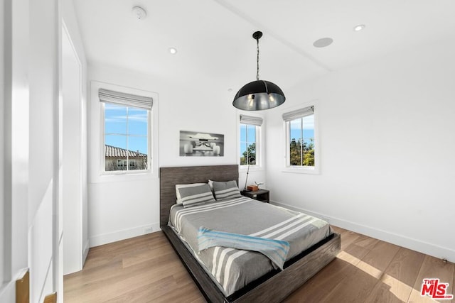 bedroom featuring light hardwood / wood-style floors