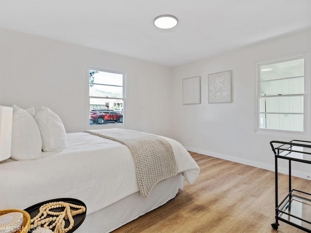 bedroom featuring light hardwood / wood-style floors